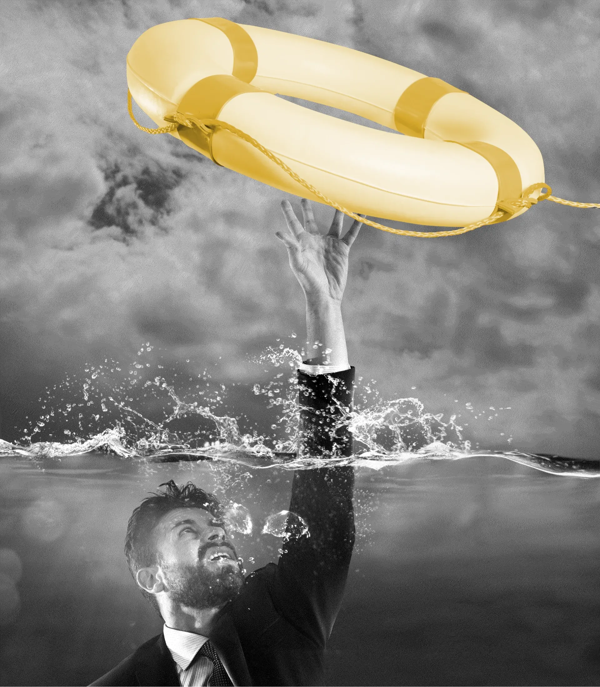 Man drowning under water reaching up to grab a life saver ring that is gold in color